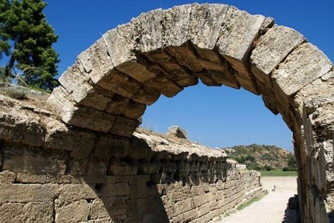 Ancient Olympia Shore Excursion with traditional lunch - Stop 1: Ancient Olympia ruins, Temple of Zeus, and the Olympic torch location