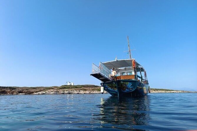 Athens Cruise Tour with Mediterranean BBQ - The transit highlights: Raftis Island statue, Blue Lagoon, and Natura 2000 coast
