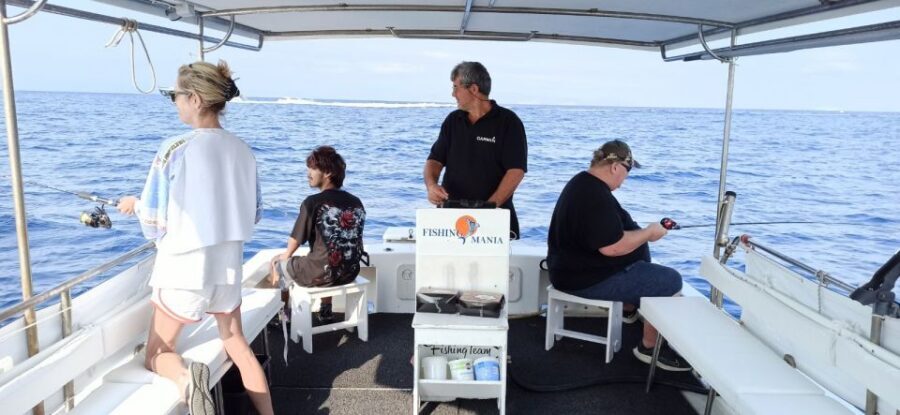 Athens: Fishing Trip Experience on a Boat with Seafood Meal - The onboard meal: snacks, Greek classics, shrimp pasta, and your catch