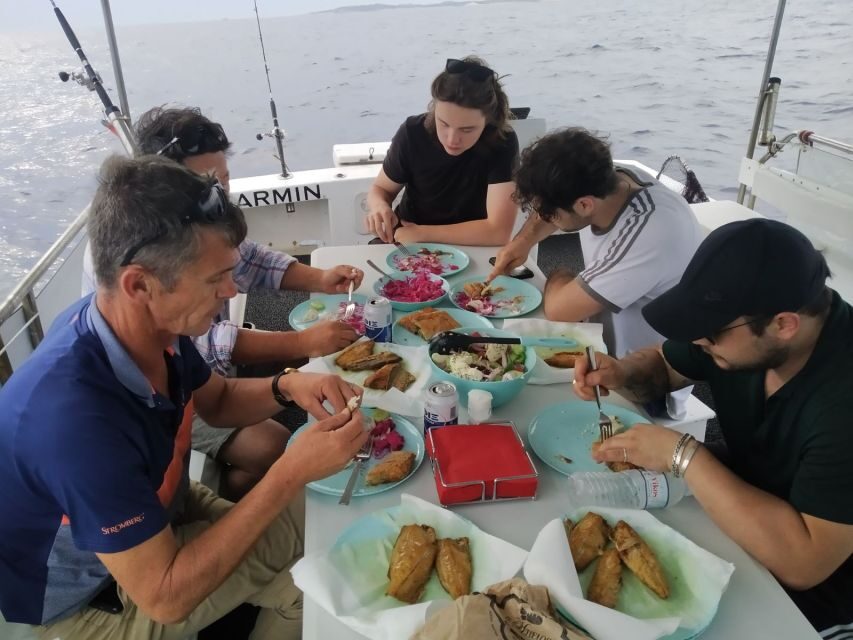 Athens: Fishing Trip Experience on a Boat with Seafood Meal - Safety and boat comfort: what the licensed setup means for you