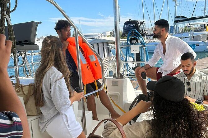 Athens Riviera Private Sail Catamaran with Meal and Wine - The crew that makes private feel worth it: Captain Nick and Ada