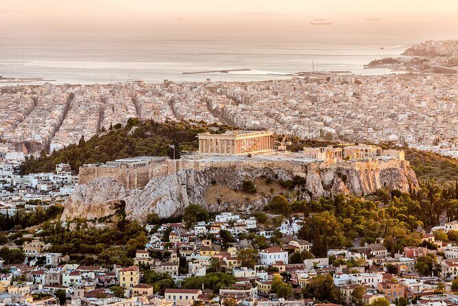 Athens sightseeing Spanish guided tour with Acropolis and museum - Syntagma Square and Omonoia: politics, architecture, and market life