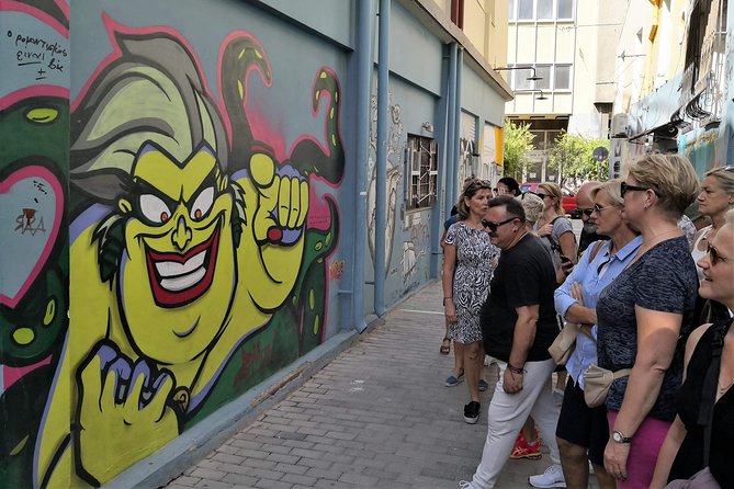 Athens Urban Street Art Tour - Omonoia’s older murals: when Athens art has history behind it