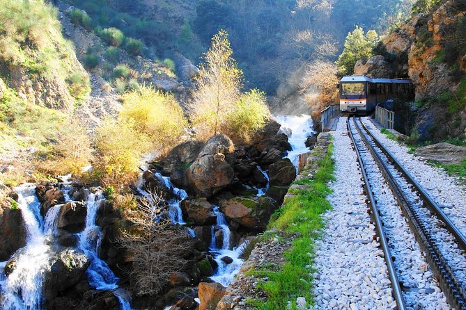 Corinth, Cave of Lakes, Odontotos Railway Private Tour with Greek Lunch Included - Kalavrita: your lunch stop under Mt Chelmos