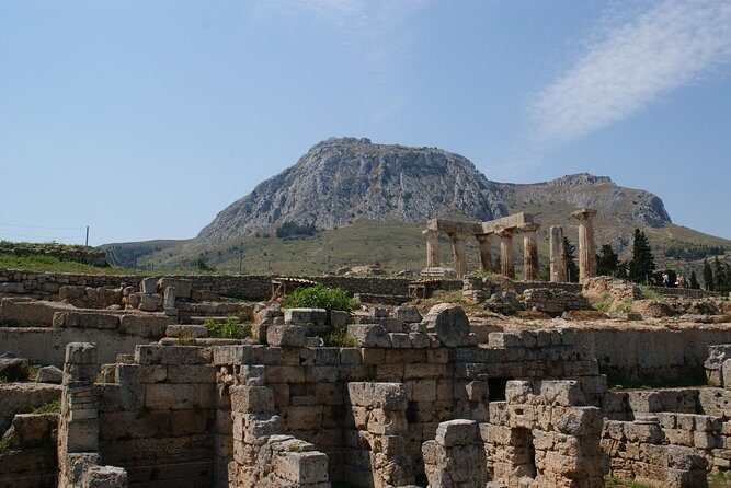 Corinth Half-Day Trip from Athens with Entrance Tickets - Ancient Corinth Archaeological Site: Temples, Forum Areas, and the Bema