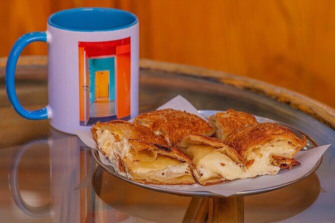 Feast on Athens: LGBTQ+ Walking Food Tour - Psiri morning bites: koulouri and bougatsa