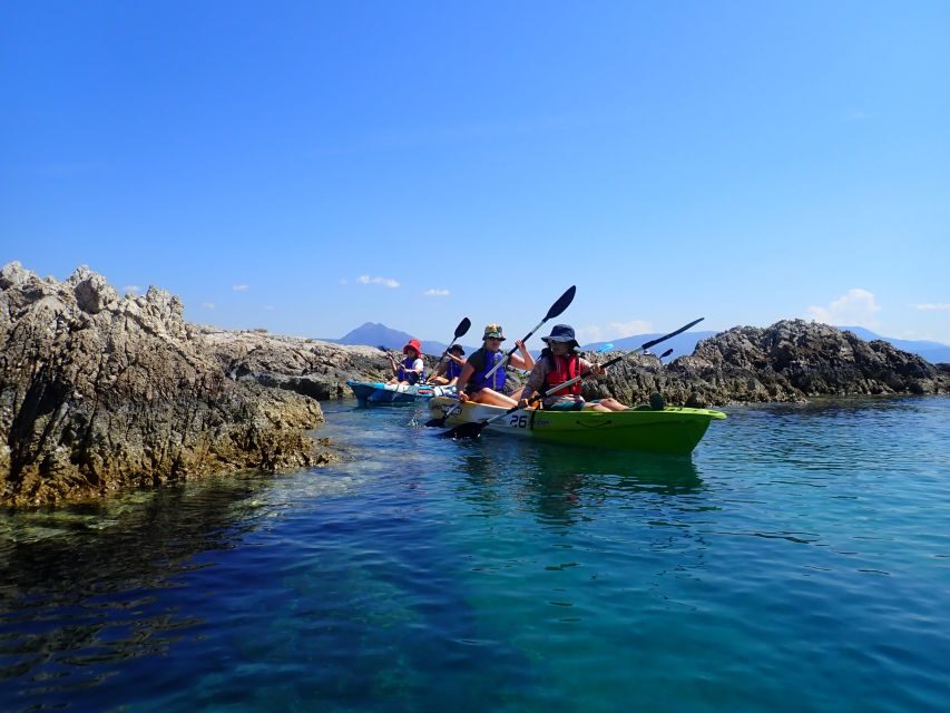 From Athens: Corinthian Gulf Guided Sea Kayaking Tour - Seal cave + pebbled beach: the turquoise arch moment