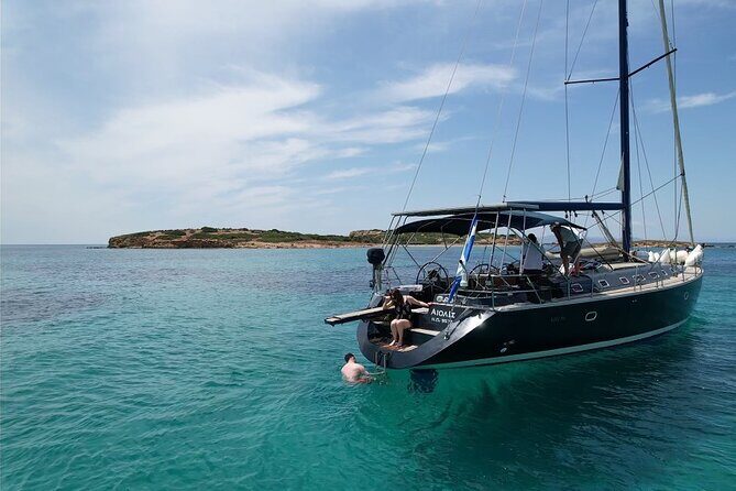 Full day cruise Aigina|Moni|Agkistri with traditional Greek feast - Moni Island Beach: Snorkeling, Floating Toys, and Real Swim Time