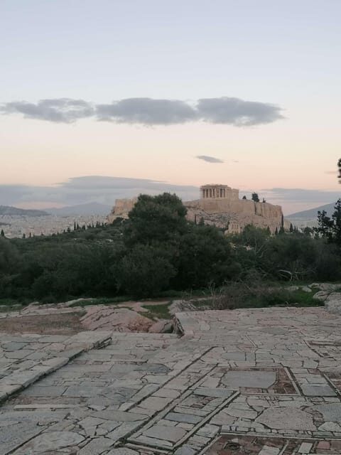Guided walking tour of Acropolis with transportation - City sightseeing by A/C coach: the Athens timeline from bus windows