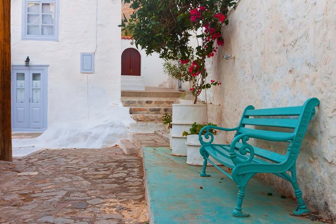 One Day Cruise to Hydra, Poros and Aegina from Athens - Stop 3: Poros Port for pine trees, sea views, and a short scenic break