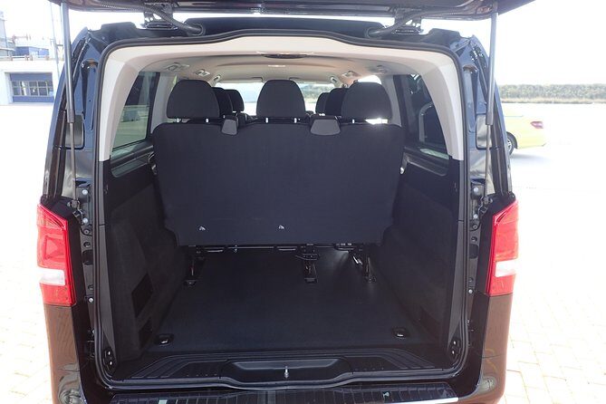 "Private Transportation by Car with Personal Driver" - Inside the car: A/C, Wi‑Fi, chargers, and real comfort