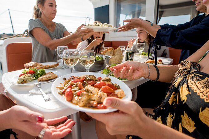 Sail the Athenian Coastline on a Catamaran with Meal & Wine - Lunch onboard: a real Greek meal, not a snack