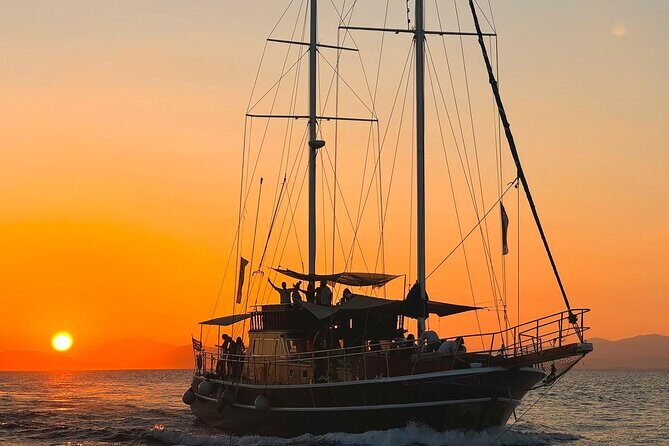 Sunset Dinner Cruise: Sunset, Swim, Drinks, and Dinner Onboard - Why a wooden-boat sunset meal beats dinner in Athens