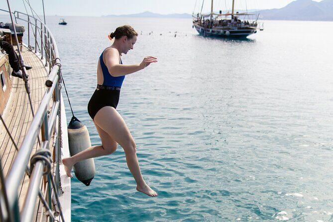 Sunset Dinner Cruise: Sunset, Swim, Drinks, and Dinner Onboard - Athens Riviera cruising: the fast way to change scenery