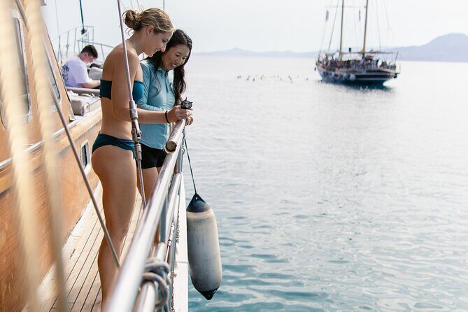 Sunset Dinner Cruise: Sunset, Swim, Drinks, and Dinner Onboard - Athens stop: settling in and setting expectations