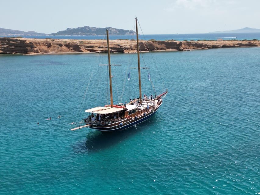 Sunset Dinner Cruise: Swim Stop, Drinks & Onboard Dining - Vouliagmeni Sunset Time and the Four Seasons Pass
